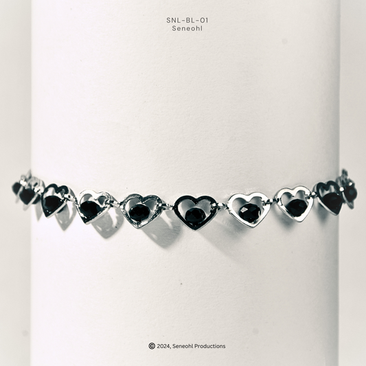 Silver Hearts on Black Bracelet